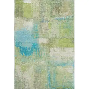 Photo of Lime Green Teal And Ivory Abstract Washable Area Rug With UV Protection
