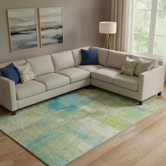 Lime Green Teal And Ivory Abstract Washable Area Rug With UV Protection Photo 1