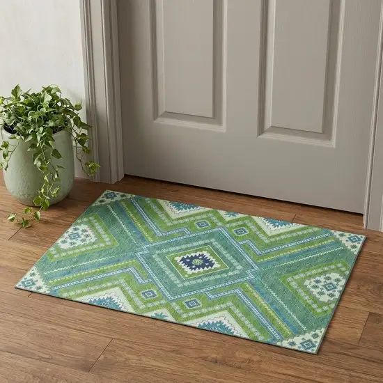 Lime Green Teal And Ivory Tribal Washable Area Rug With UV Protection Photo 1
