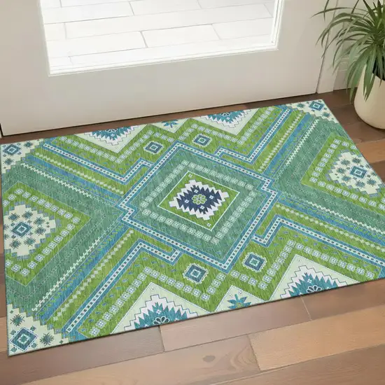 Lime Green Teal And Ivory Tribal Washable Area Rug With UV Protection Photo 1