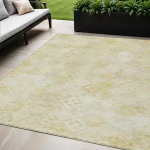 Photo of Linen And Gold Geometric Washable Indoor Outdoor Area Rug