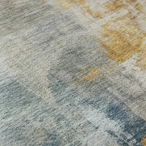 Photo of Linen Gold And Teal Abstract Washable Area Rug With UV Protection