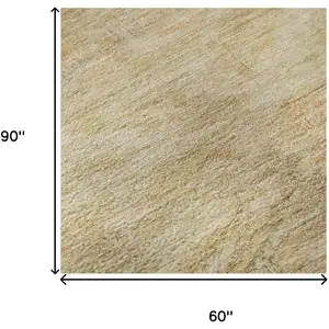 Photo of Linen Gold And Wheat Abstract Geometric Washable Area Rug With UV Protection