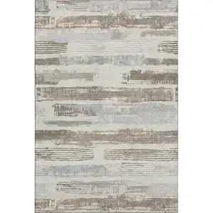 Photo of Linen Gray And Ivory Striped Washable Area Rug With UV Protection
