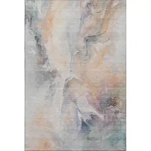 Photo of Linen Peach And Ivory Abstract Washable Area Rug With UV Protection