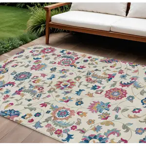 Photo of Linen Pink And Denim Blue Floral Washable Indoor Outdoor Area Rug