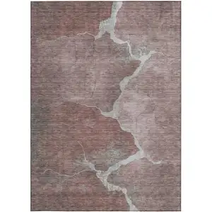 Photo of Mauve And Beige Abstract Washable Indoor Outdoor Area Rug