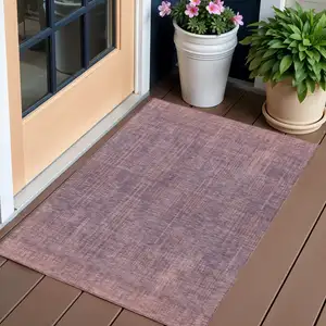 Photo of Mauve And Dark Purple Striped Washable Indoor Outdoor Area Rug