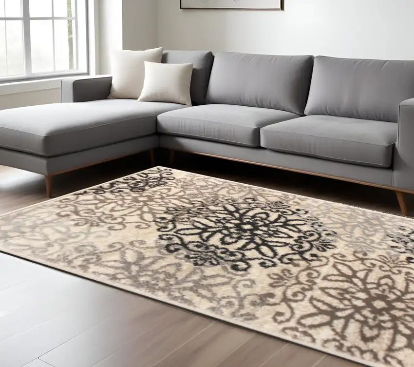 Beige Black And Brown Floral Medallion Area Rug Photo 1