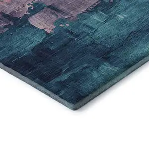 Photo of Merlot Gold Blue And Purple Abstract Washable Area Rug With UV Protection