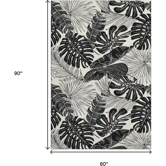 Midnight And Ivory Geometric Washable Area Rug With UV Protection Photo 3