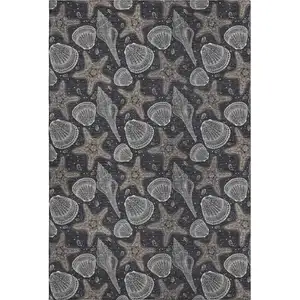 Photo of Midnight And Taupe Geometric Washable Area Rug With UV Protection