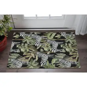 Photo of Midnight Green And Brown Geometric Washable Area Rug With UV Protection
