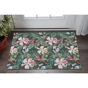 Photo of Midnight Green And Pink Geometric Washable Area Rug With UV Protection