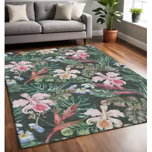 Photo of Midnight Green And Pink Geometric Washable Area Rug With UV Protection