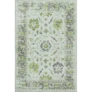 Photo of Mint Green And Gray Oriental Washable Area Rug With UV Protection