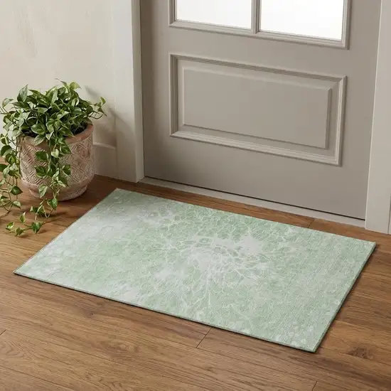 Mint Green And Ivory Abstract Washable Area Rug With UV Protection Photo 1