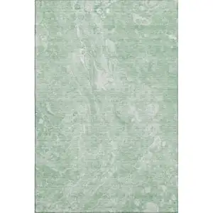 Photo of Mint Green And Ivory Abstract Washable Area Rug With UV Protection