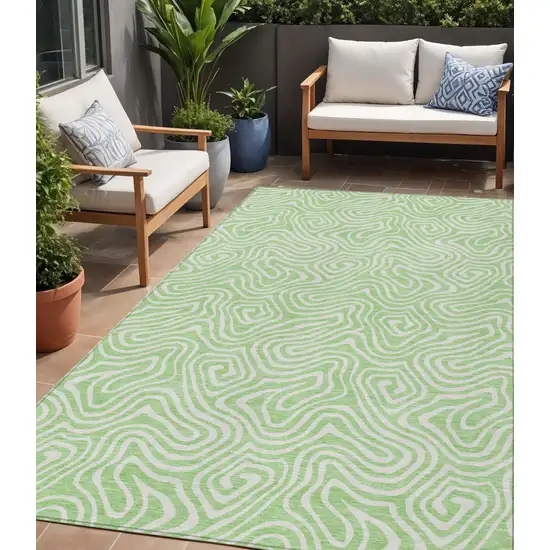 Mint Green And Ivory Abstract Washable Indoor Outdoor Area Rug Photo 1