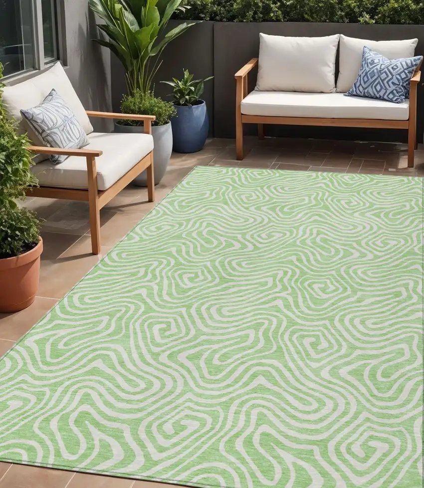 Mint Green And Ivory Abstract Washable Indoor Outdoor Area Rug Photo 1
