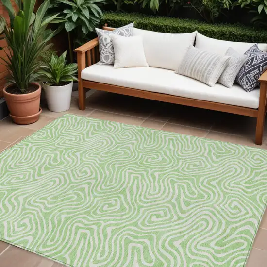 Mint Green And Ivory Abstract Washable Indoor Outdoor Area Rug Photo 1