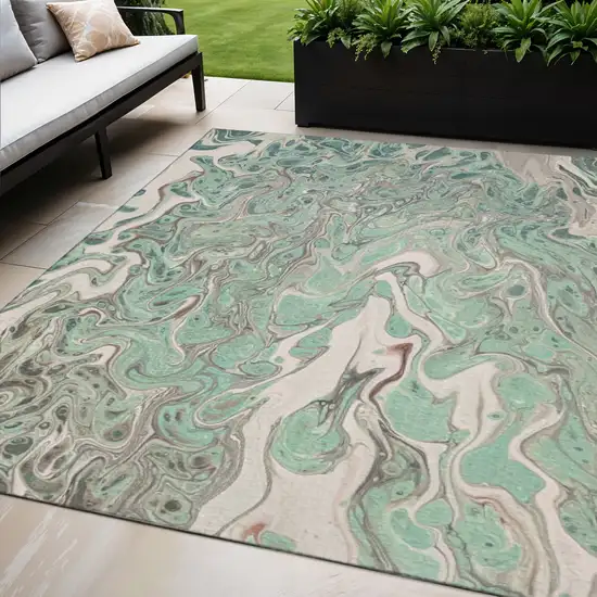 Mint Green And Ivory Abstract Washable Indoor Outdoor Area Rug Photo 1