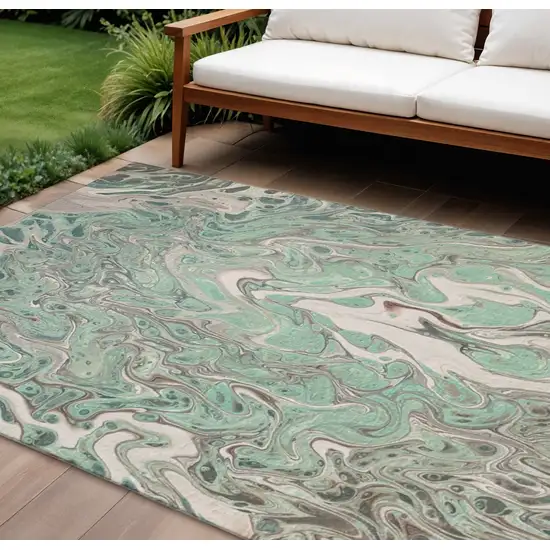 Mint Green And Ivory Abstract Washable Indoor Outdoor Area Rug Photo 1