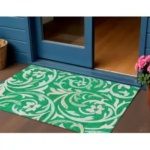 Photo of Mint Green And Ivory Floral Washable Indoor Outdoor Area Rug