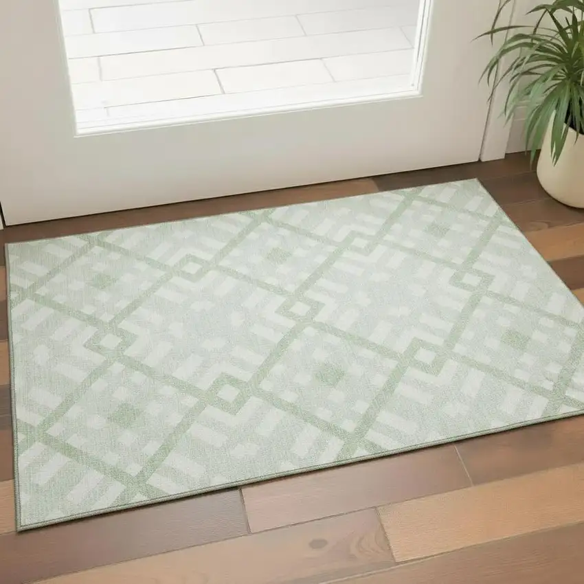 Mint Green And Ivory Geometric Washable Area Rug With UV Protection Photo 1