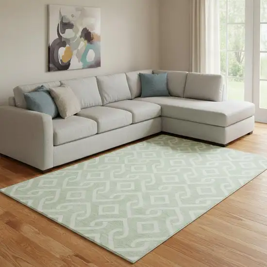 Mint Green And Ivory Geometric Washable Area Rug With UV Protection Photo 1