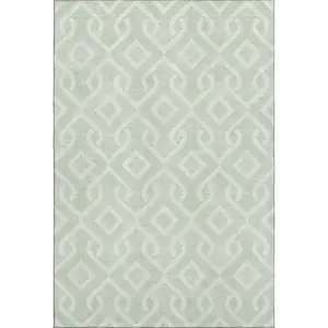 Photo of Mint Green And Ivory Geometric Washable Area Rug With UV Protection