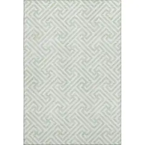 Photo of Mint Green And Ivory Geometric Washable Area Rug With UV Protection