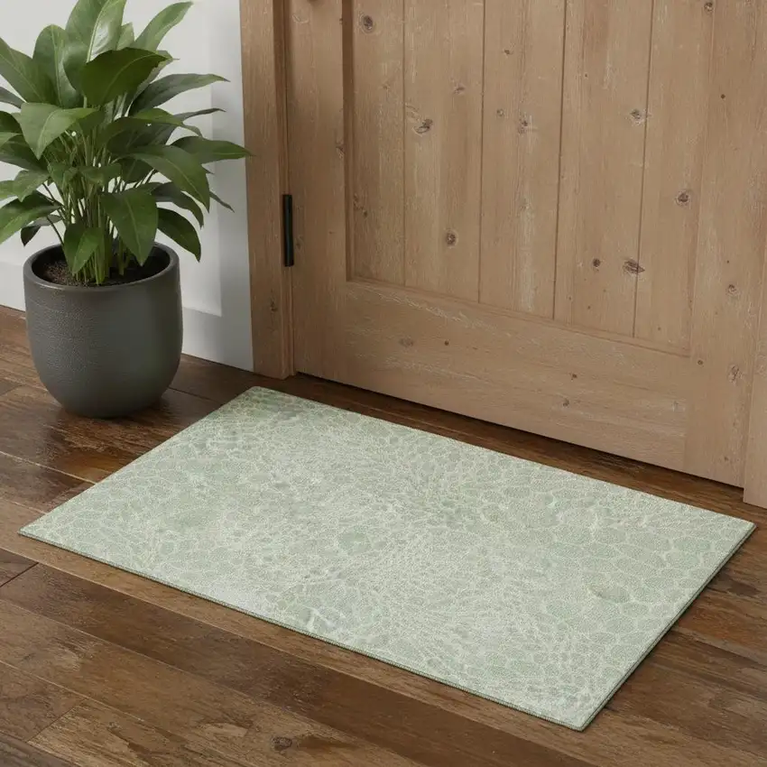 Mint Green And Ivory Geometric Washable Area Rug With UV Protection Photo 1