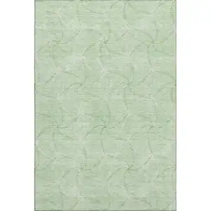 Photo of Mint Green And Ivory Geometric Washable Area Rug With UV Protection