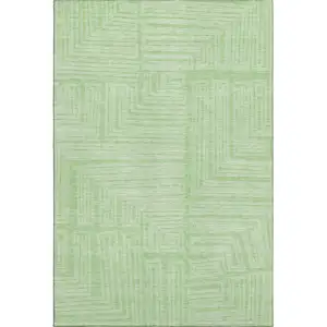 Photo of Mint Green And Ivory Geometric Washable Area Rug With UV Protection