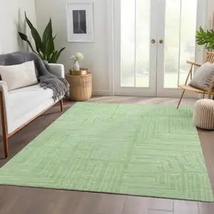 Photo of Mint Green And Ivory Geometric Washable Area Rug With UV Protection