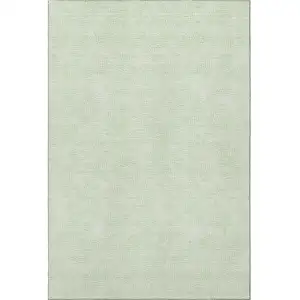 Photo of Mint Green And Ivory Geometric Washable Area Rug With UV Protection