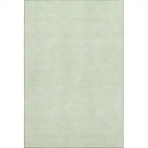 Photo of Mint Green And Ivory Geometric Washable Area Rug With UV Protection