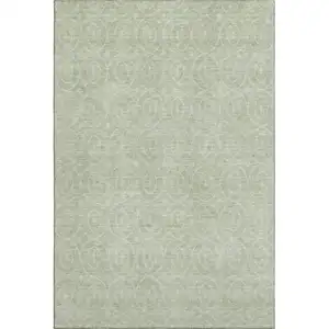Photo of Mint Green And Ivory Geometric Washable Area Rug With UV Protection