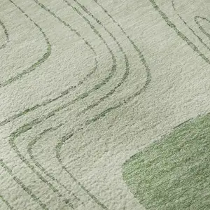 Photo of Mint Green And Ivory Geometric Washable Area Rug With UV Protection