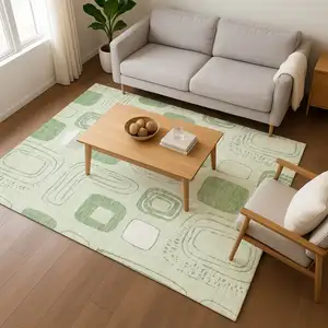 Photo of Mint Green And Ivory Geometric Washable Area Rug With UV Protection
