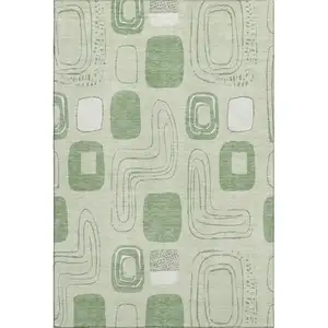 Photo of Mint Green And Ivory Geometric Washable Area Rug With UV Protection