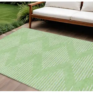 Photo of Mint Green And Ivory Geometric Washable Indoor Outdoor Area Rug