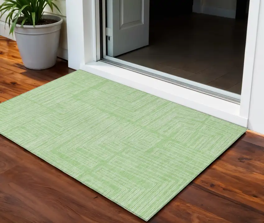 Mint Green And Ivory Geometric Washable Indoor Outdoor Area Rug Photo 1