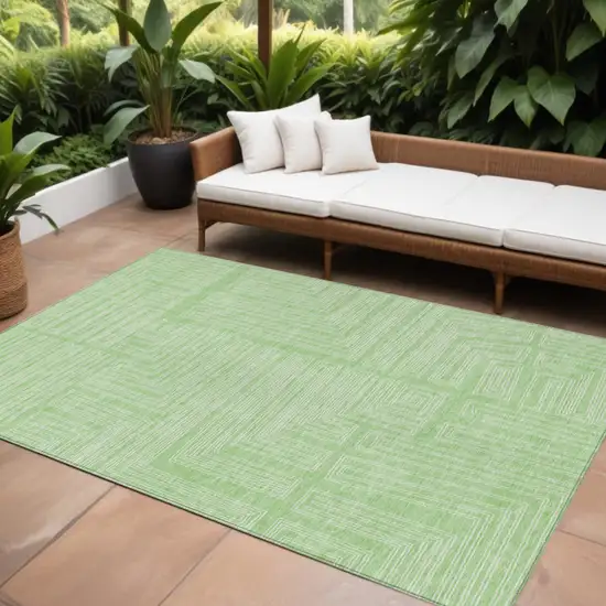Mint Green And Ivory Geometric Washable Indoor Outdoor Area Rug Photo 1