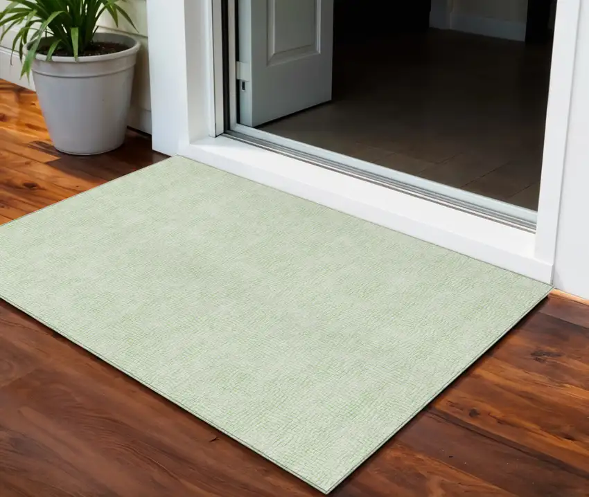 Mint Green And Ivory Geometric Washable Indoor Outdoor Area Rug Photo 1
