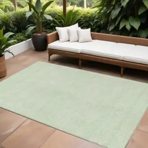 Photo of Mint Green And Ivory Geometric Washable Indoor Outdoor Area Rug
