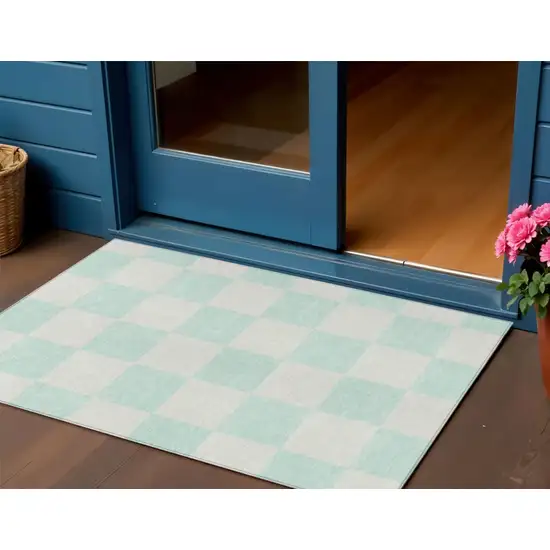 Mint Green And Ivory Geometric Washable Indoor Outdoor Area Rug Photo 1