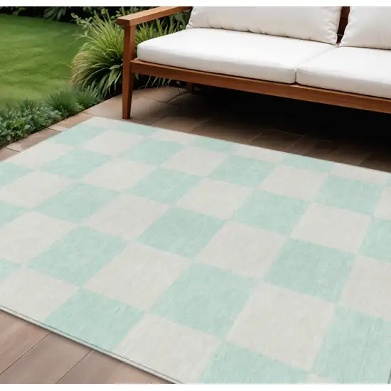 Mint Green And Ivory Geometric Washable Indoor Outdoor Area Rug Photo 1