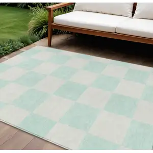 Photo of Mint Green And Ivory Geometric Washable Indoor Outdoor Area Rug